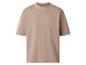 Beige T-shirt met korte mouwen en een losse pasvorm.