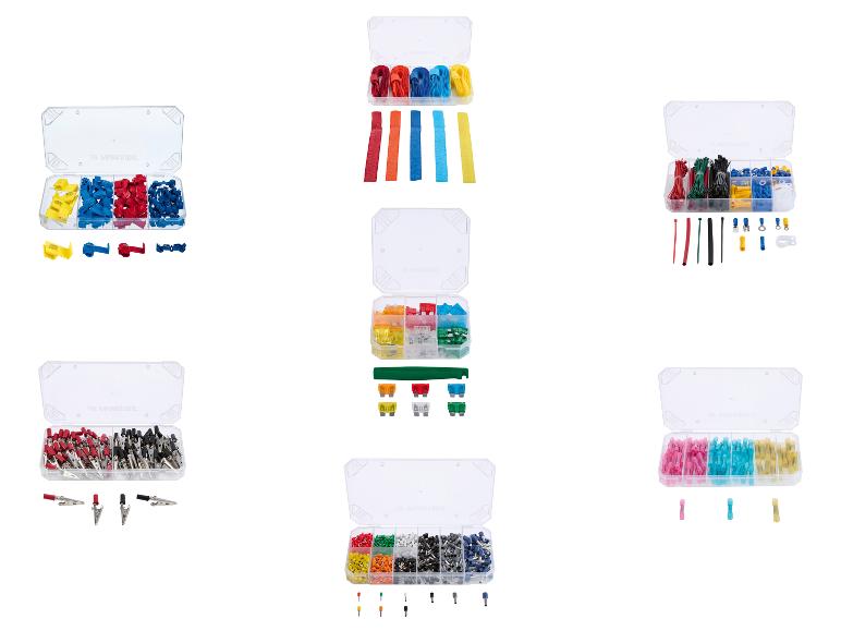 Assortiment aan elektrische connectoren, kabelbinders en zekeringen in opbergdozen.
