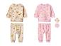 Twee babyoutfits, één beige met een jungle-dierenpatroon en één roze met kleurrijke stippen.