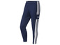 Blauwe Adidas trainingsbroek met witte strepen.