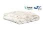 Wit gewatteerd dekbed met Tencel en Made in EU logo's.