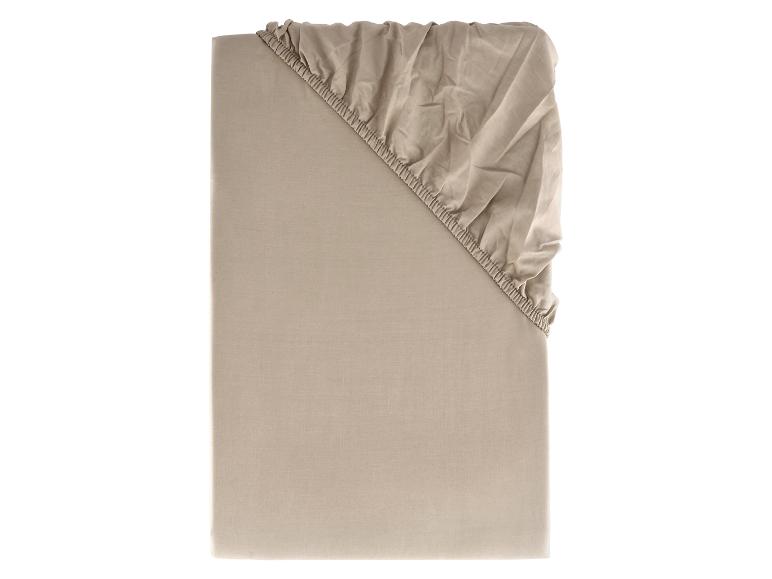 Beige katoenen hoeslaken.