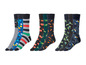 Zes paar Happy Socks met verschillende prints, waaronder strepen, stippen en groente.