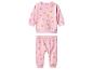 Roze baby joggingpak met oranje en paarse stippen.