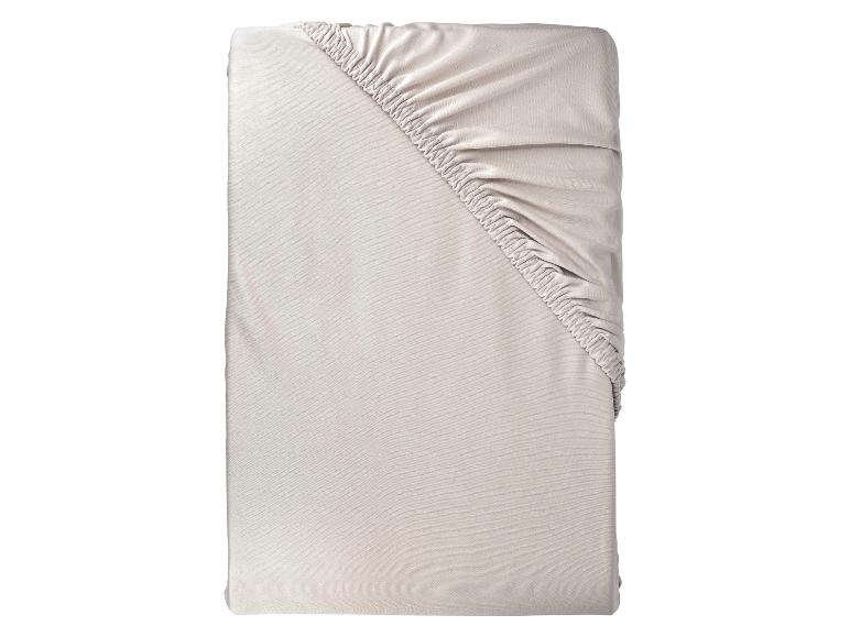 Lichtbeige matrasbeschermer.