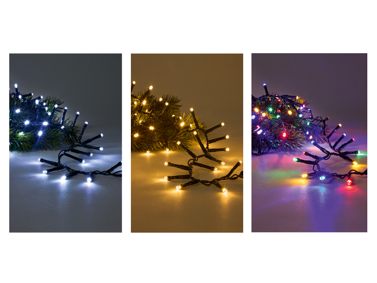 Witte, warmwitte en veelkleurige LED-kerstverlichting op dennentakken.