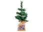 Kleine kunstkerstboom in decoratieve verpakking met kerstballen.
