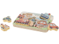 Houten puzzel met voertuigmotieven en een stadslandschap.