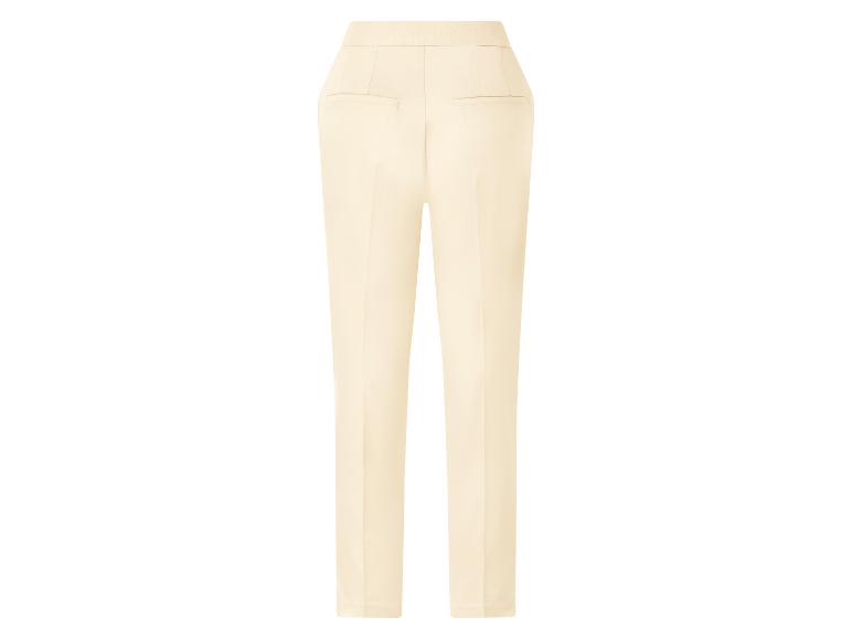 Crèmekleurige damesbroek met hoge taille, achteraanzicht.