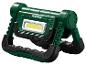 Groene Parkside werklamp met handvat en LED-paneel.
