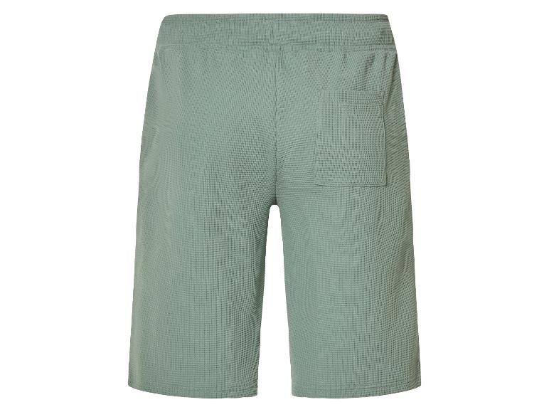 Sagegroene shorts van wafelpiqué.