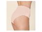 Vrouw in huidkleurige hoge tailleslip
