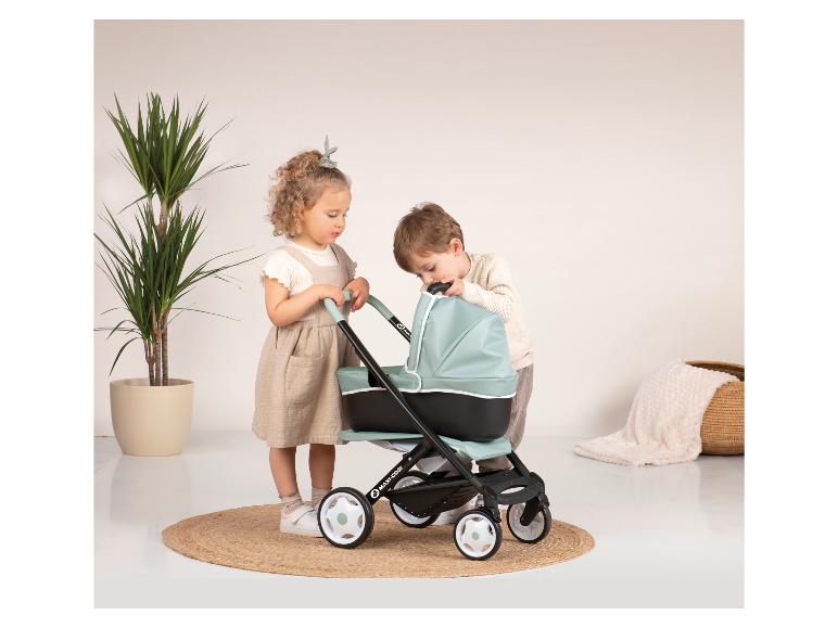 Twee kinderen kijken naar een Maxi-Cosi kinderwagen.