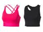 Twee sporttops: een roze sportbeha met gekruiste bandjes en een zwart topje.