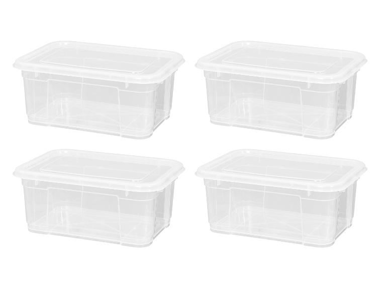 Vier doorzichtige rechthoekige plastic opbergdozen met deksels