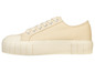 Beige canvas sneakers met een dikke zool.