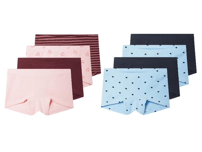 Zes meisjes onderbroeken in verschillende kleuren en patronen.