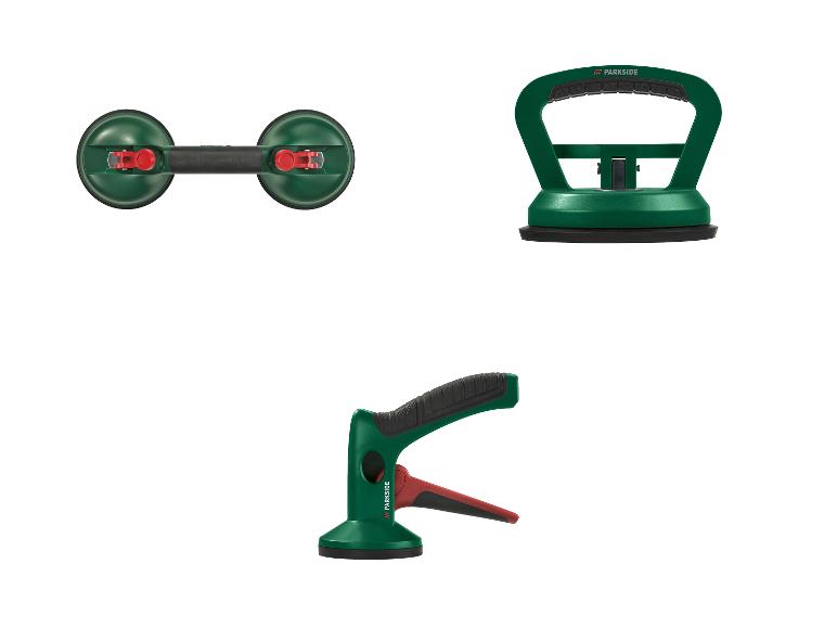 Drie groene zuignappen voor glas en tegels met zwarte en rode details.