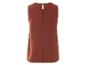 Terracotta top zonder mouwen, open rug.