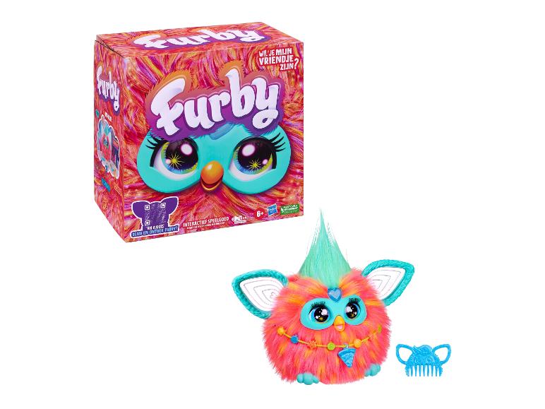 Furby interactief speelgoed in en uit de doos, met een kam.