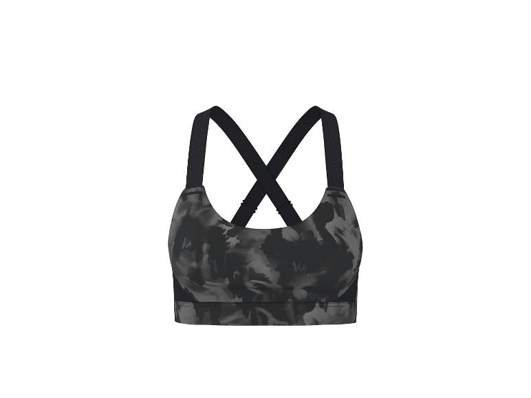 Zwart-grijze sportbeha met abstract patroon en gekruiste bandjes.