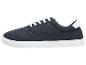 Donkerblauwe herensneakers met witte veters en zool.