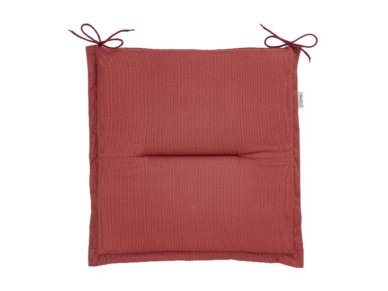 Baksteenrood stoelkussen met strikjes, merk LIVARNO.