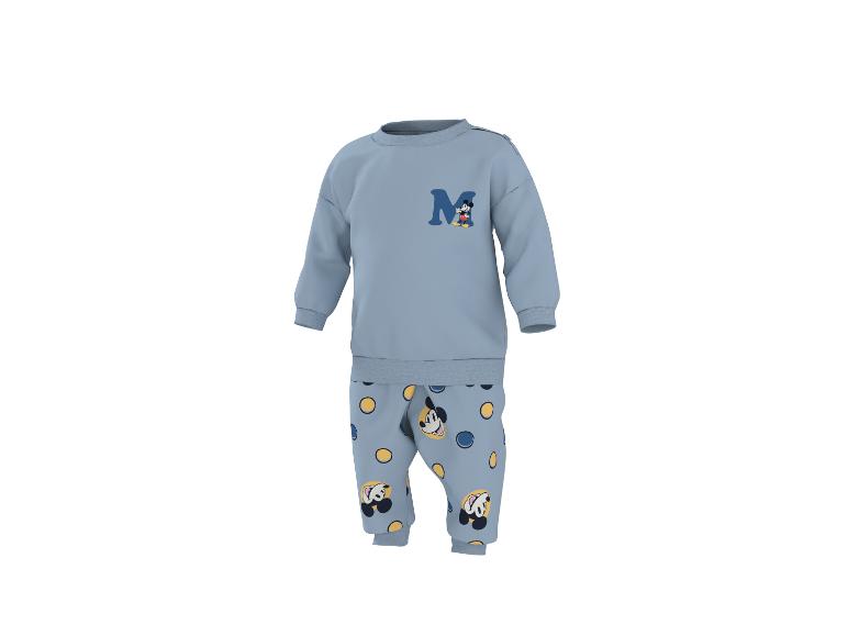 Blauwe babypyjama set met Mickey Mouse en stippen.