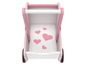 Een roze houten speelgoed kinderwagen met hartjes.