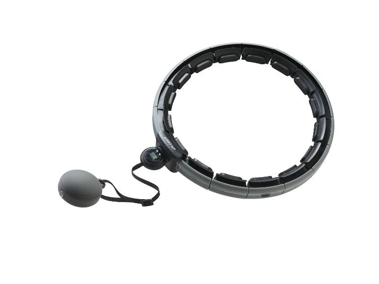 Een grijze hoelahoep met een digitale teller en een aangehecht bolvormig gewicht.