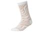 Witte sok met beige zebraprint.