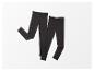 Twee zwarte leggings op een witte achtergrond.