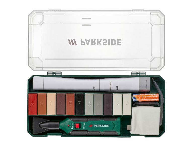 PARKSIDE vloerreparatieset met wasstiften, gereedschap en batterijen in een open koffer.