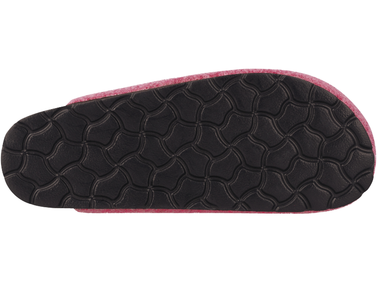 Zool van een roze slipper met een zwart antislip patroon.