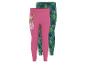 Twee kinderleggings, één roze met een tekenfilmfiguur en één groene met een bladpatroon.