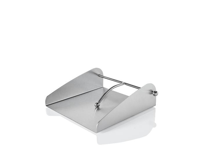 Een zilveren servetdispenser.