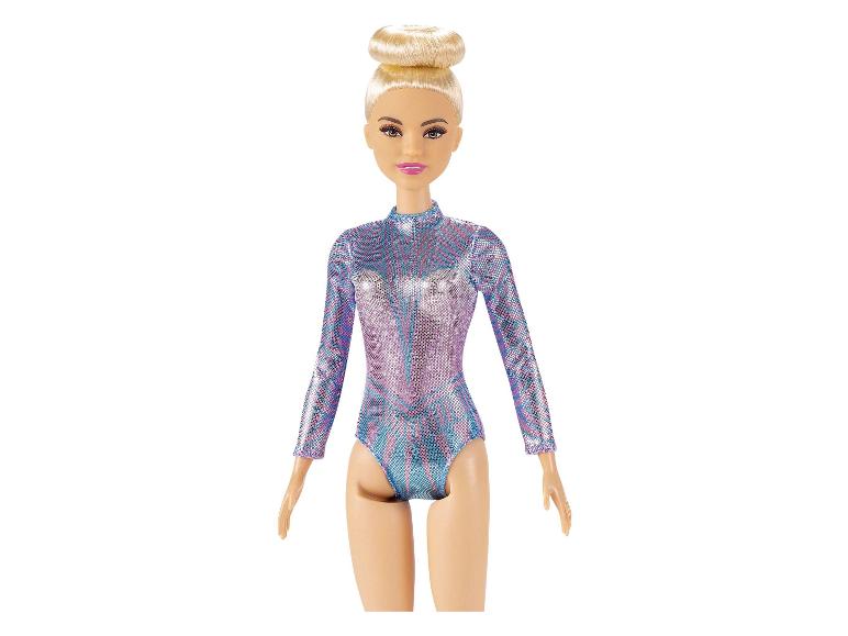 Barbie pop met een glimmende turnpak.