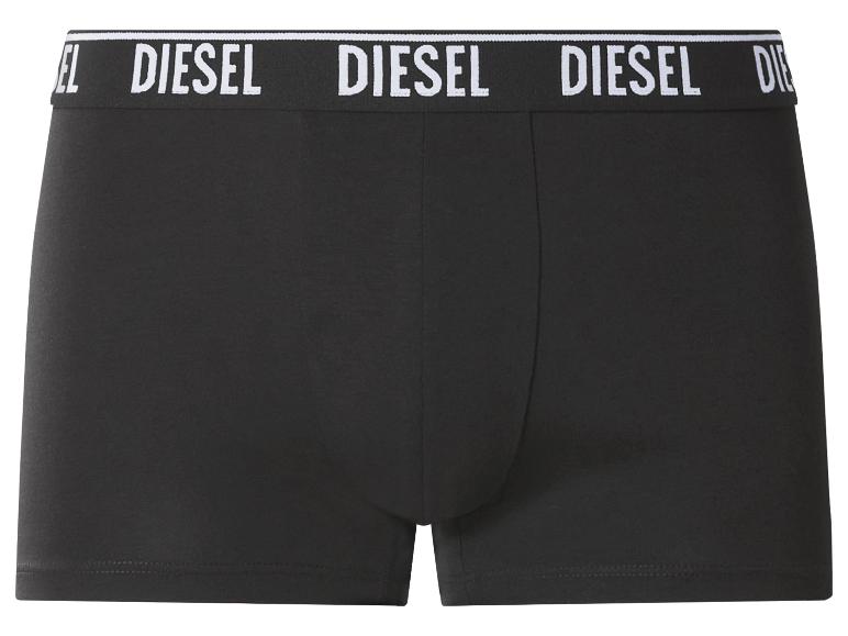 Zwarte herenboxershort met witte tekst op de tailleband.