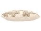 Beige decoratief kussen met een getextureerd, pluizig patroon