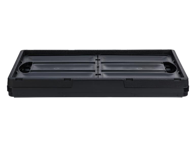 Zwarte opvouwbare plastic doos.
