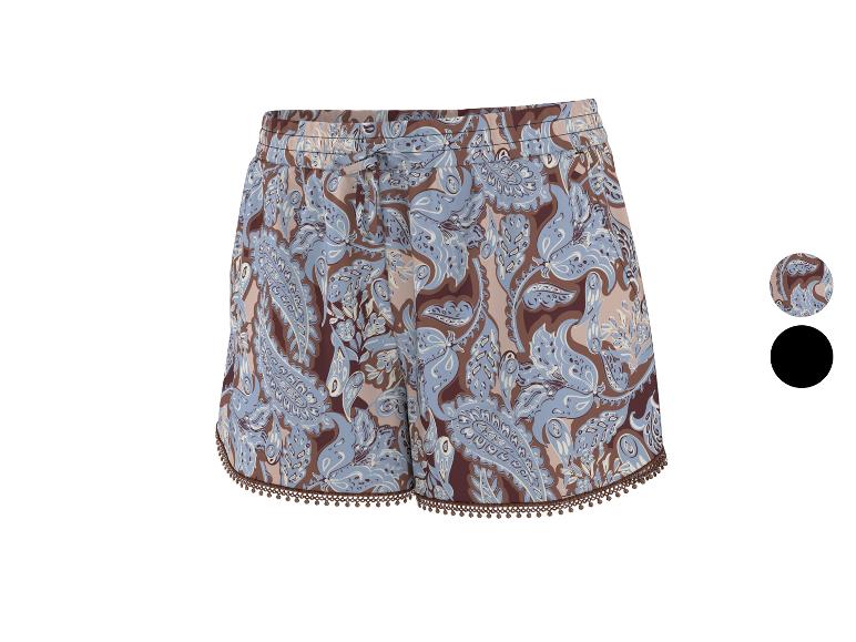 Dames shorts met blauw en bruin paisley-patroon, met kwastjesrand.