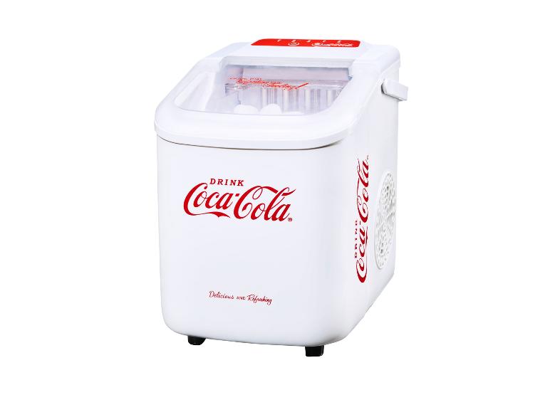 Een witte Coca-Cola ijsmachine voor het maken van ijs.