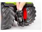 Het achter-aanhangmechanisme van een Fendt speelgoedtractor wordt getoond.