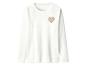 Wit fleece shirt met lange mouwen en een bruin hart op de borst.