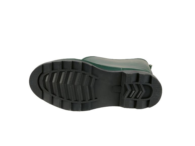 Groene rubberen laars, onderaanzicht, toont de zool met profiel