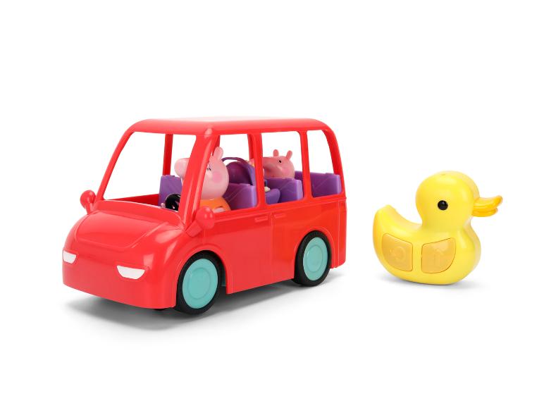 Rode speelgoedauto met figuren en een gele badeend.