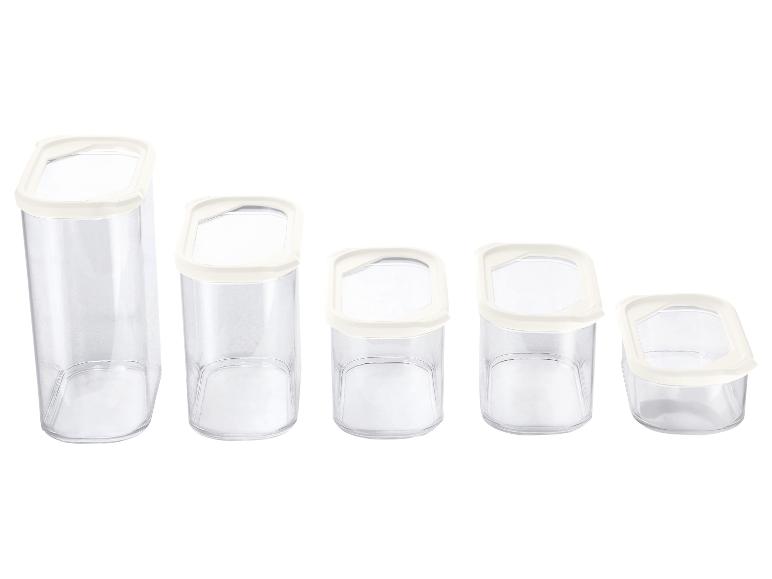 Set van 5 transparante voedselbewaarbakjes met witte deksels.