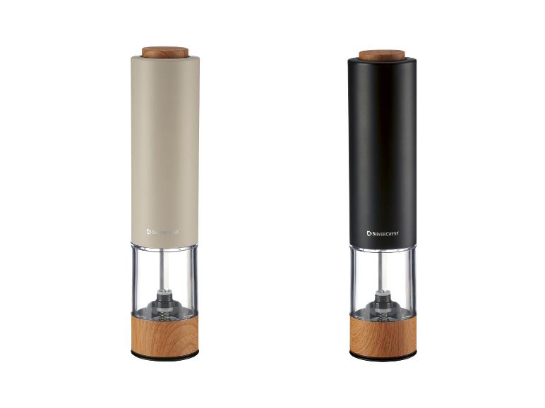 Twee elektrische kruidenmolens in beige en zwart, met houten elementen.