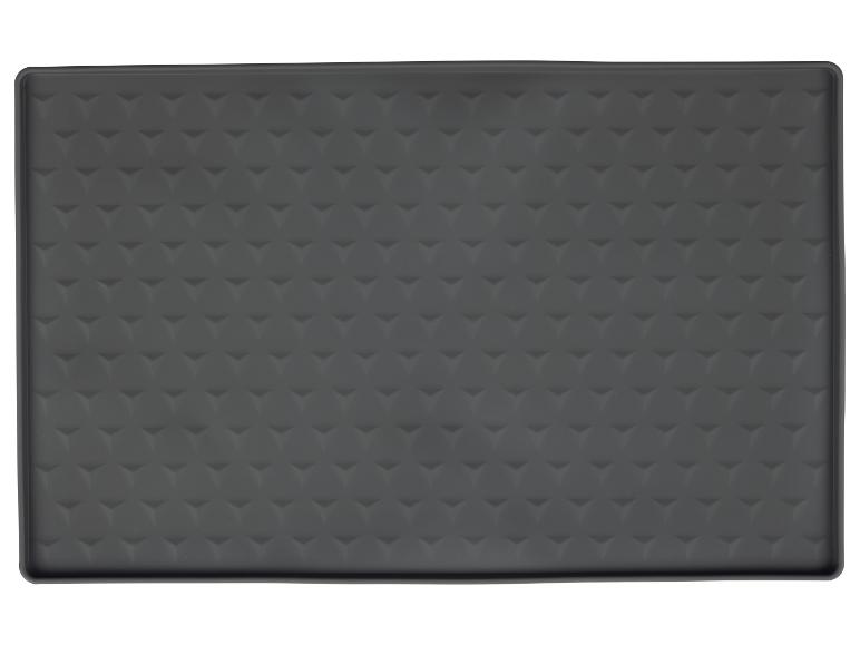 Donkergrijze siliconen mat met reliëfpatroon.