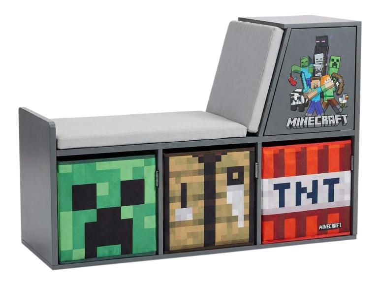Grijze opbergbank met kussens en drie stoffen dozen met videogame-thema.